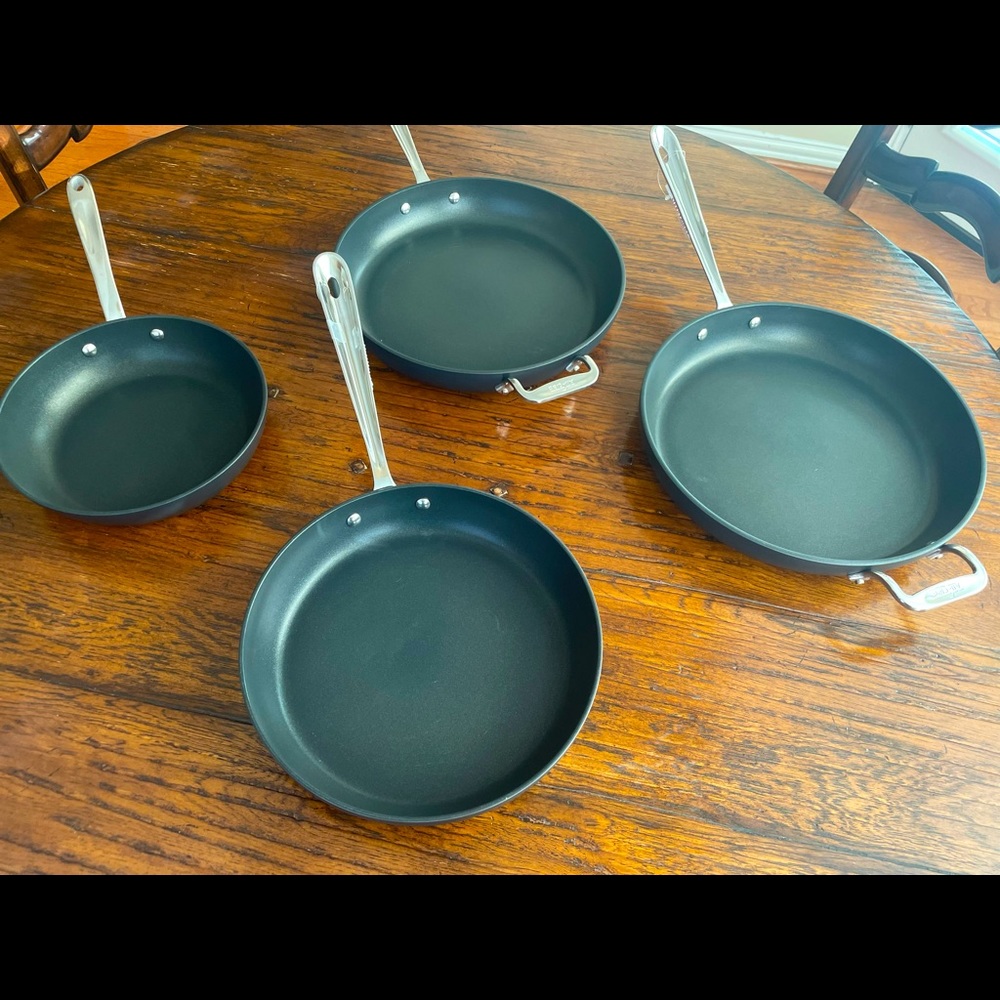 4 BRAND NEW ALL-CLAD COOKWARE. Retails for $800